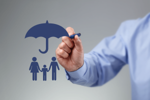 Man drawing an umbrella over family icon