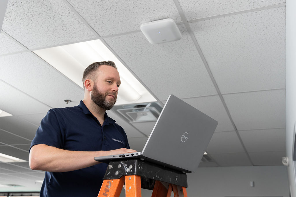 Engineer implementing a wireless network upgrade