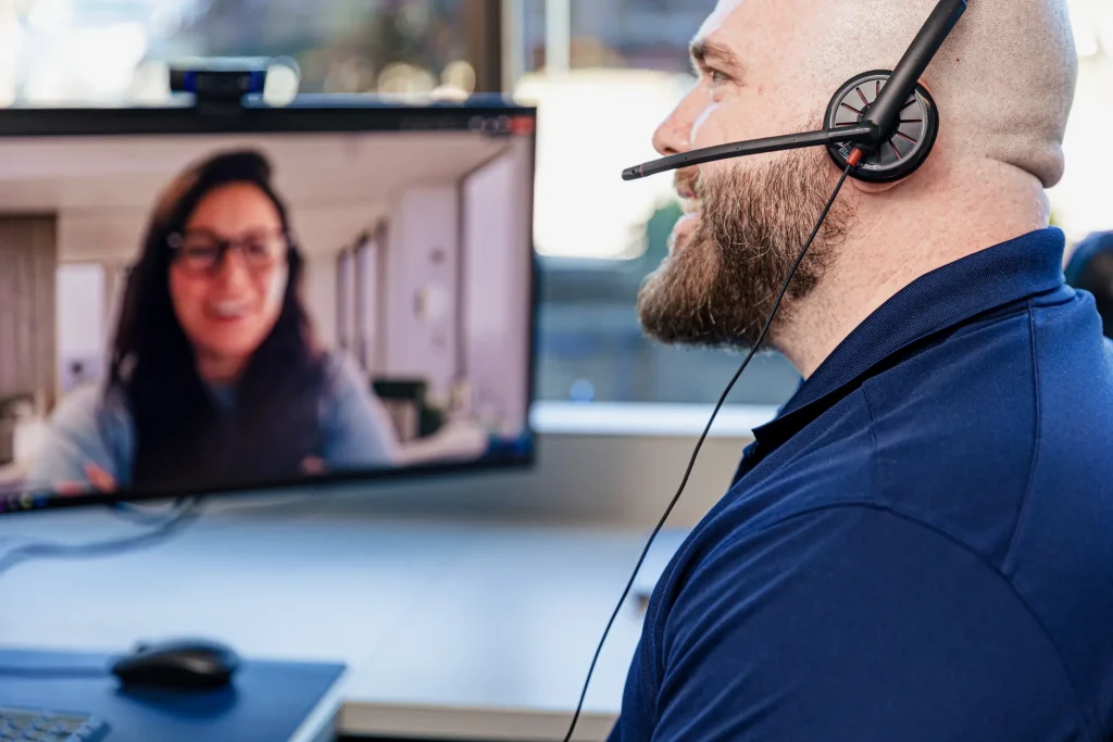 Man talking with woman virtually