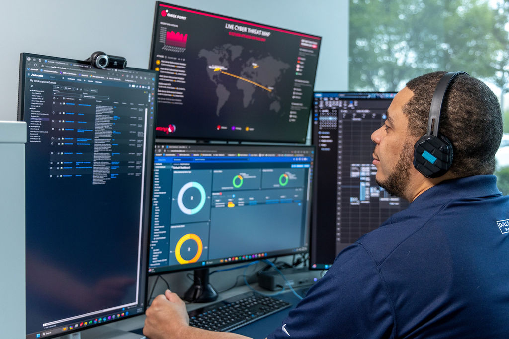 Man monitoring customer's managed BCDR appliance