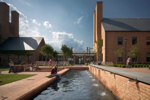 College campus with fountain and sidewalk