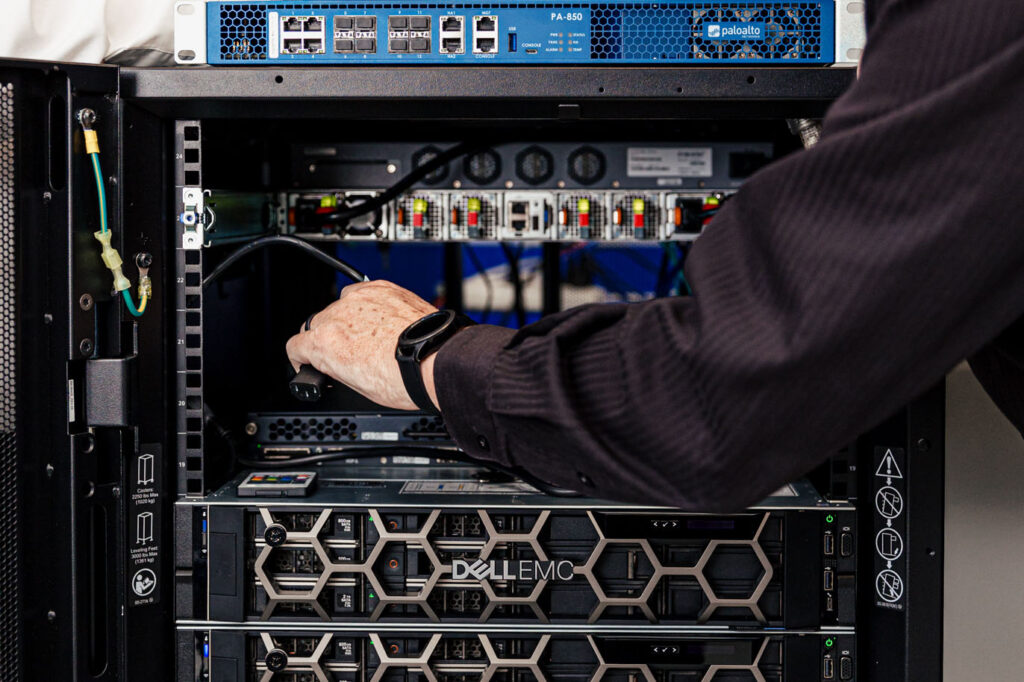 Man installing a data center backup solution