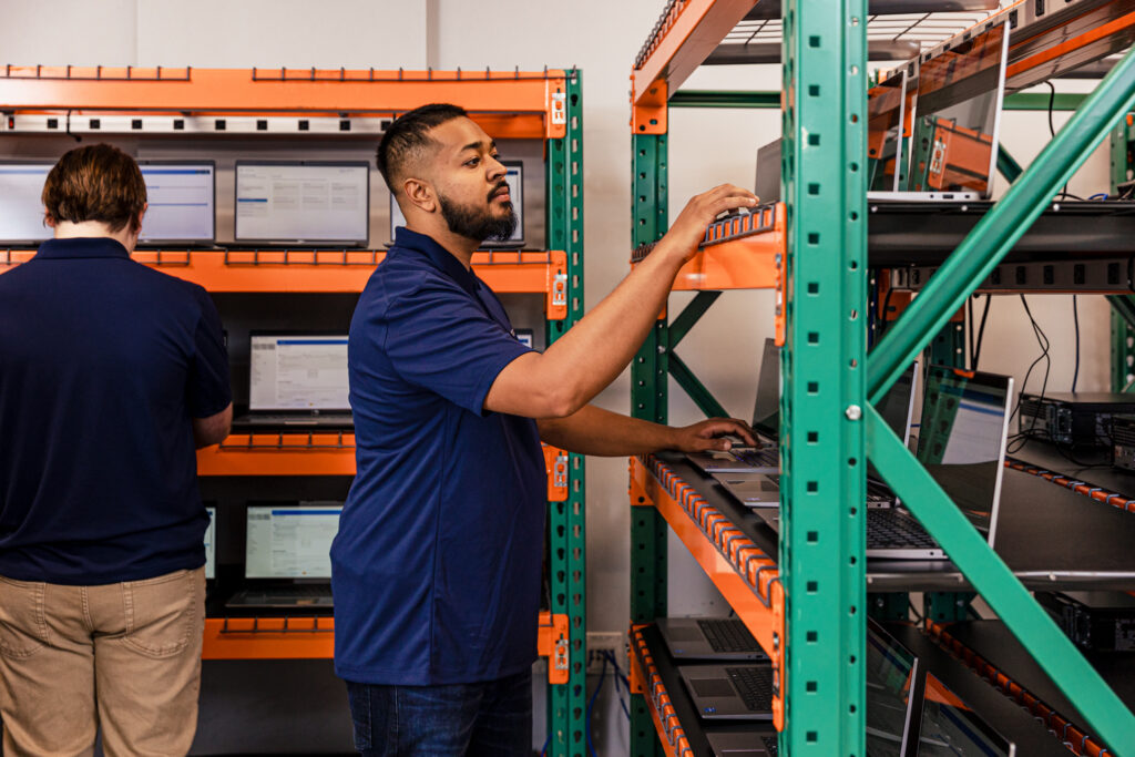 Man working on computer deployment