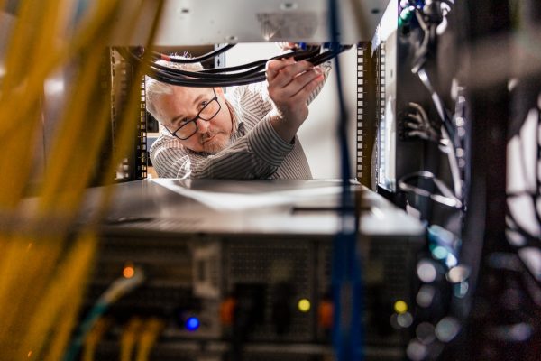 Man wiring a server