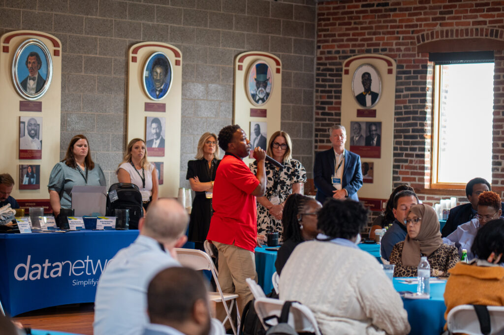attendee speaking at event